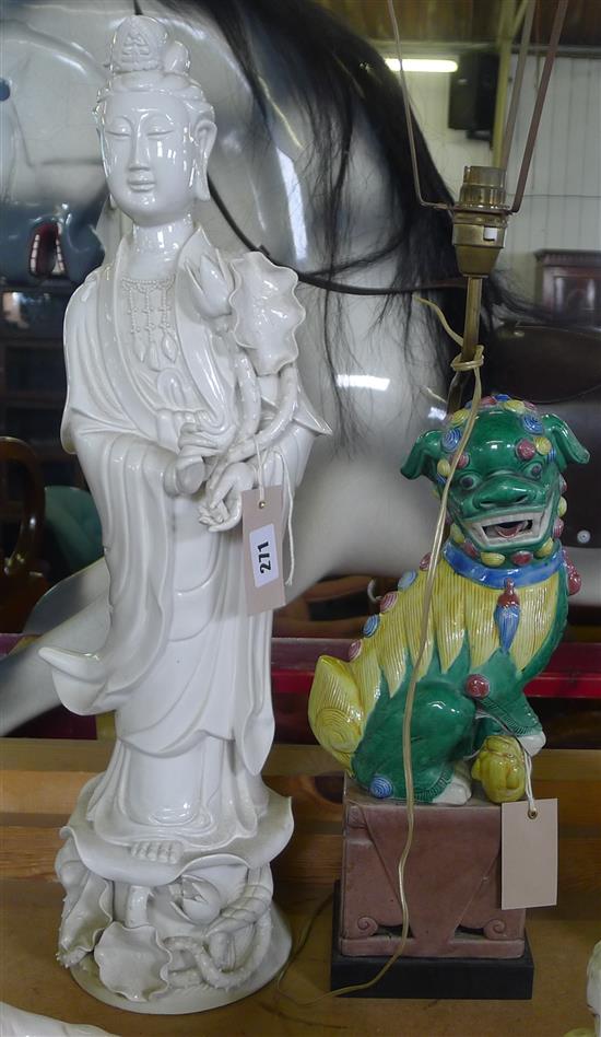 Sancai-glazed lion dog table lamp & a large blanc de chine figure of Guanyin